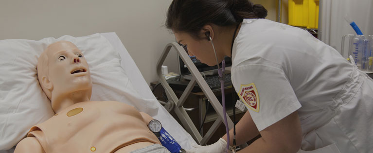 Students get hands-on practical training during a health sciences class