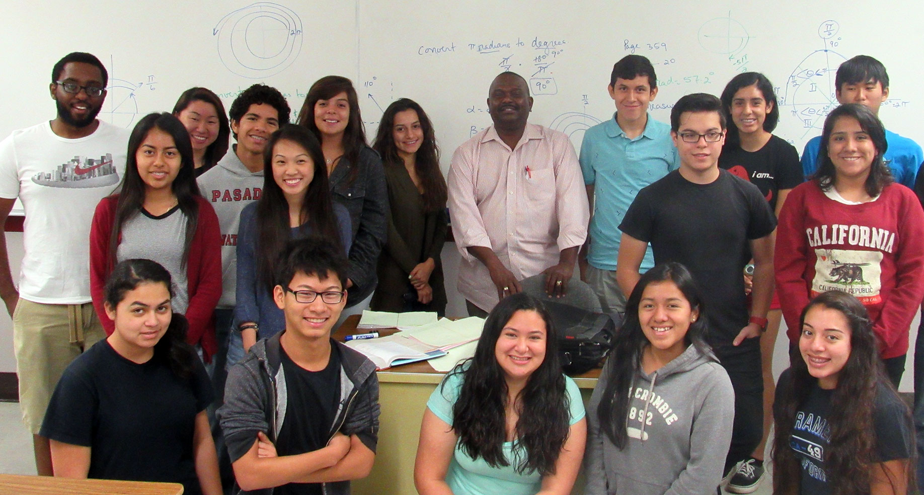 Upward Bound pose for a photo in a math class.