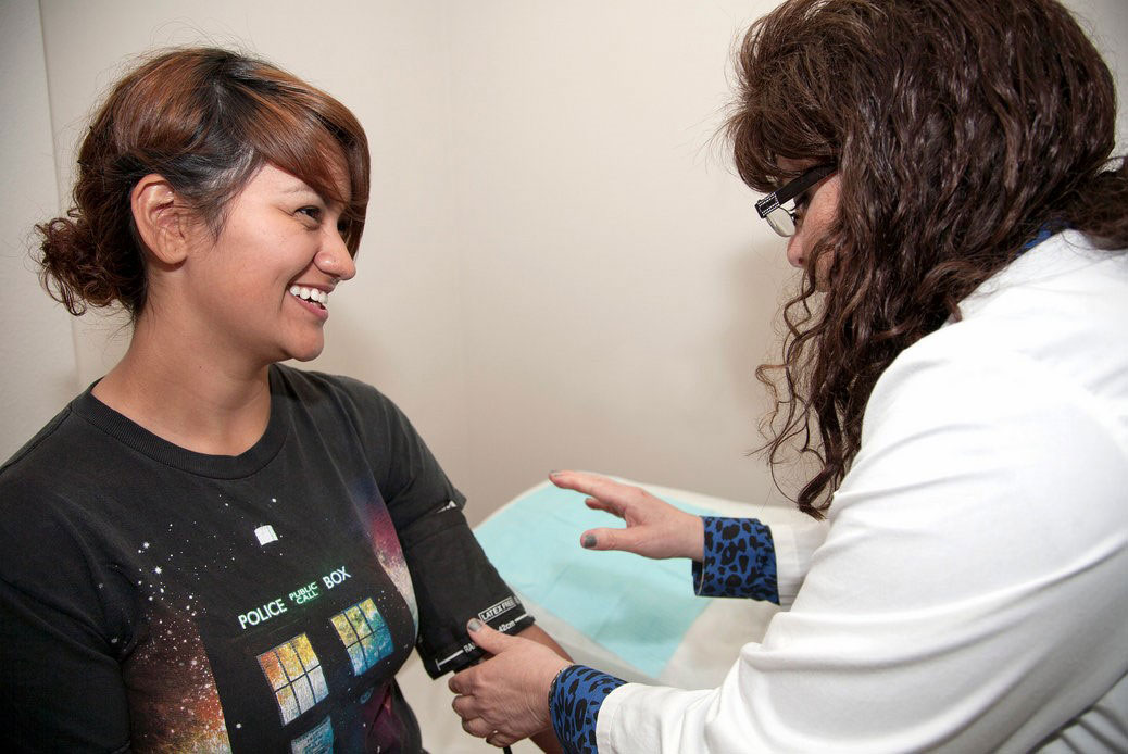 A student is seen by a nurse in the health center